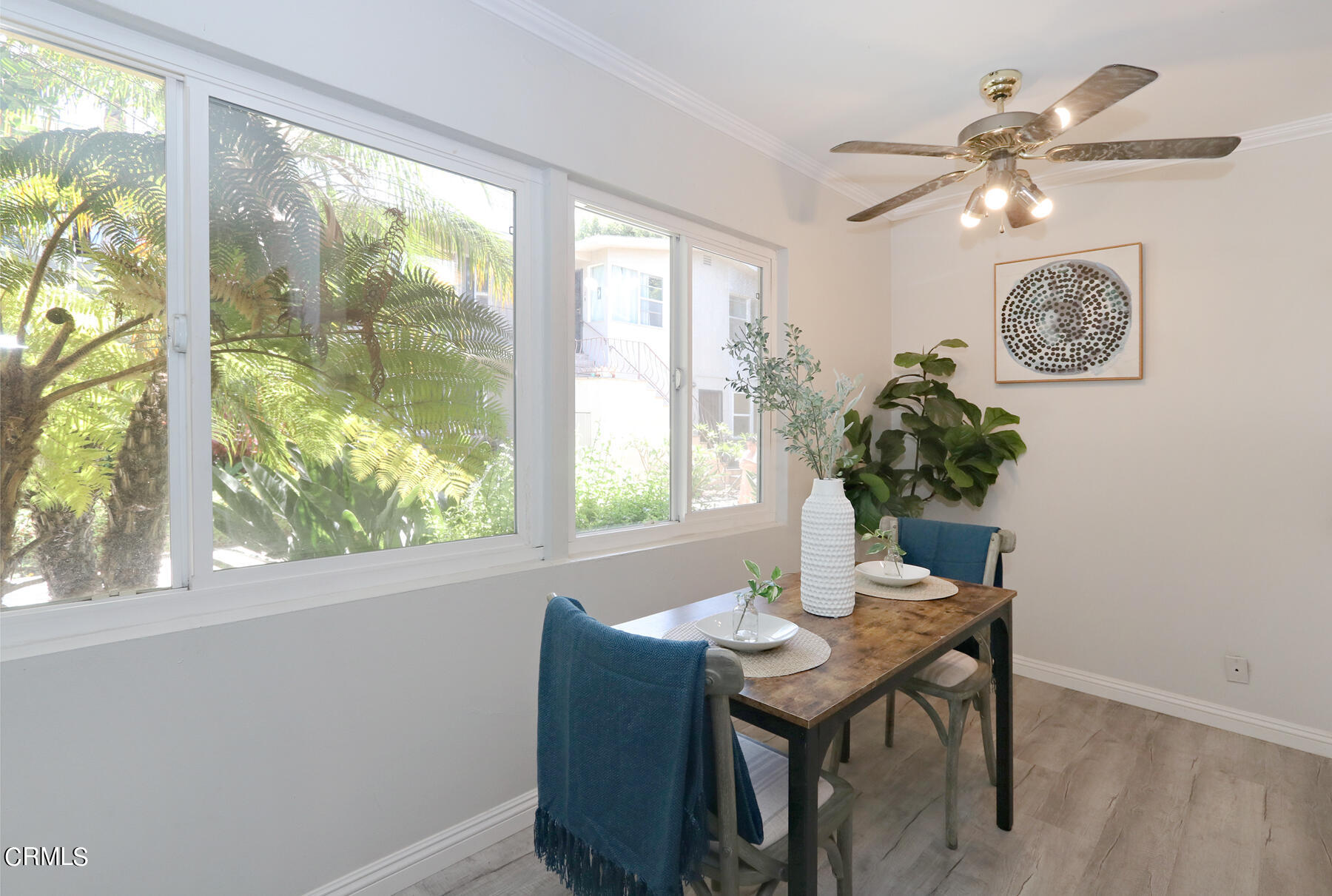 1023 East Appleton Street, Unit 5 Long Beach, CA 90802 - Photo 6 of 15 a dining room with furniture and window