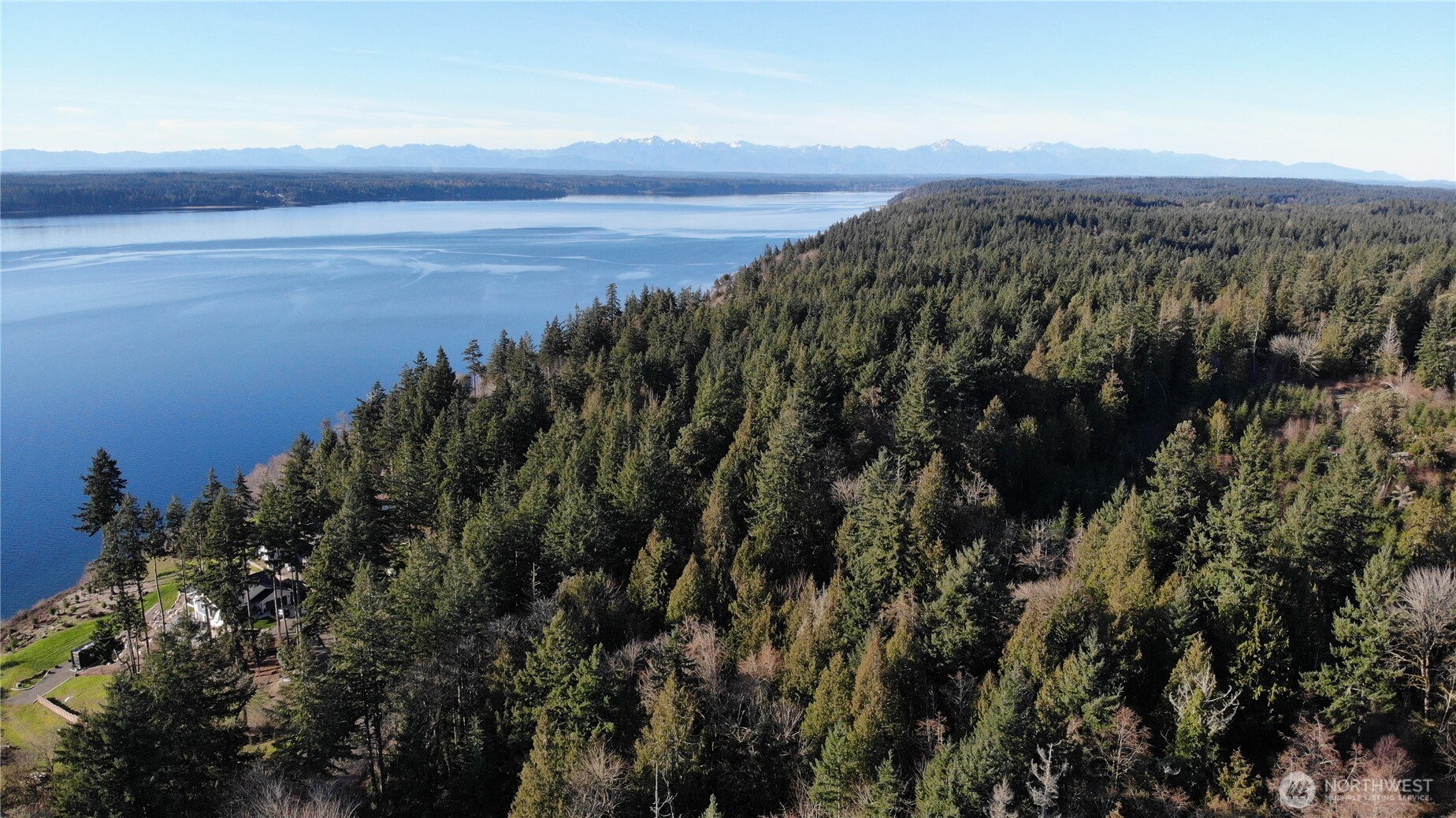 7515 Whiteman Road Southwest Longbranch, WA 98351 - Photo 15 of 18 a view of a city with an ocean