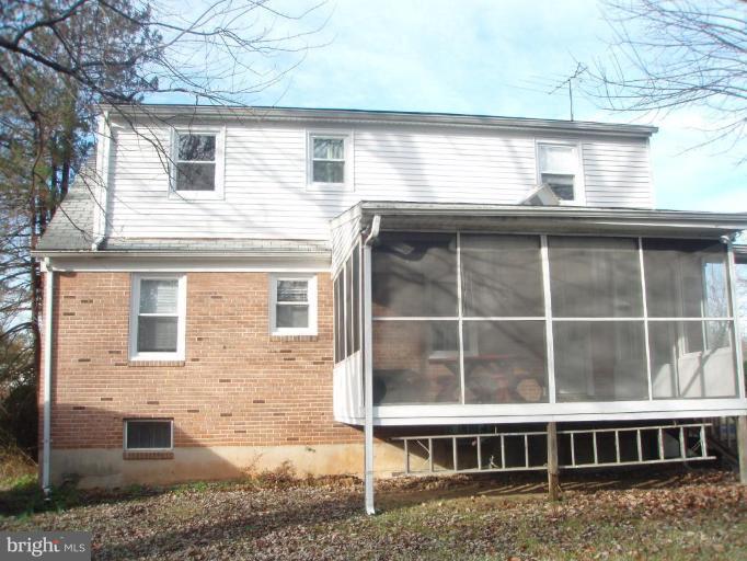 4131 Raleigh Road Pikesville, MD 21208 - Photo 2 of 11 a view of a house with a window
