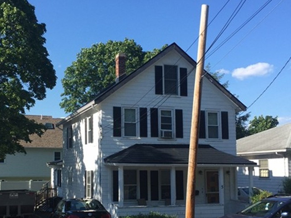 5 Arnold Street Arlington, MA 02476 - Photo 3 of 7 a view of a house with a yard