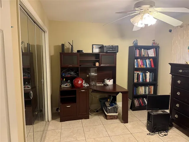 a view of a workspace with furniture