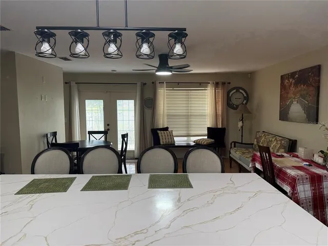a view of a dining room with furniture