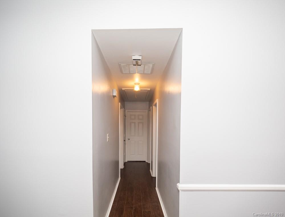 1300 Rock Point Road Charlotte, NC 28270 - Photo 6 of 13 a view of a hallway with a white walls