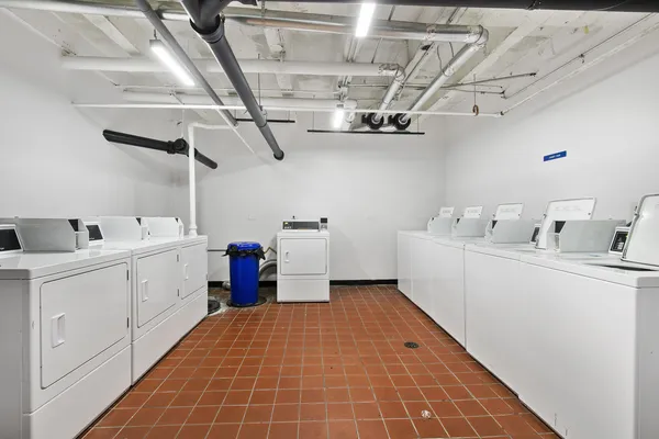 a utility room with cabinets