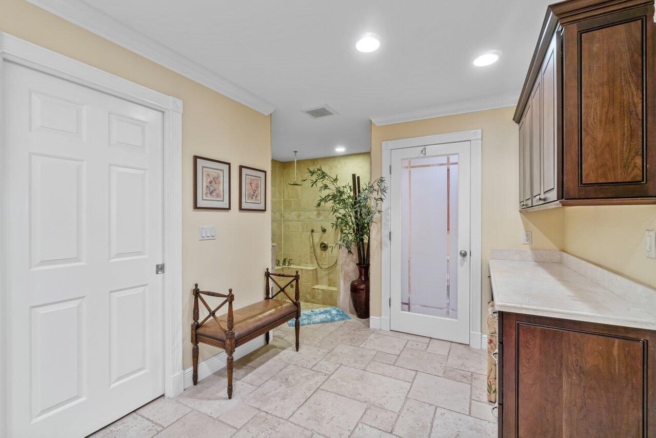 5861 Roebuck Road Jupiter, FL 33458 - Photo 26 of 74 a view of a entryway with furniture and front door