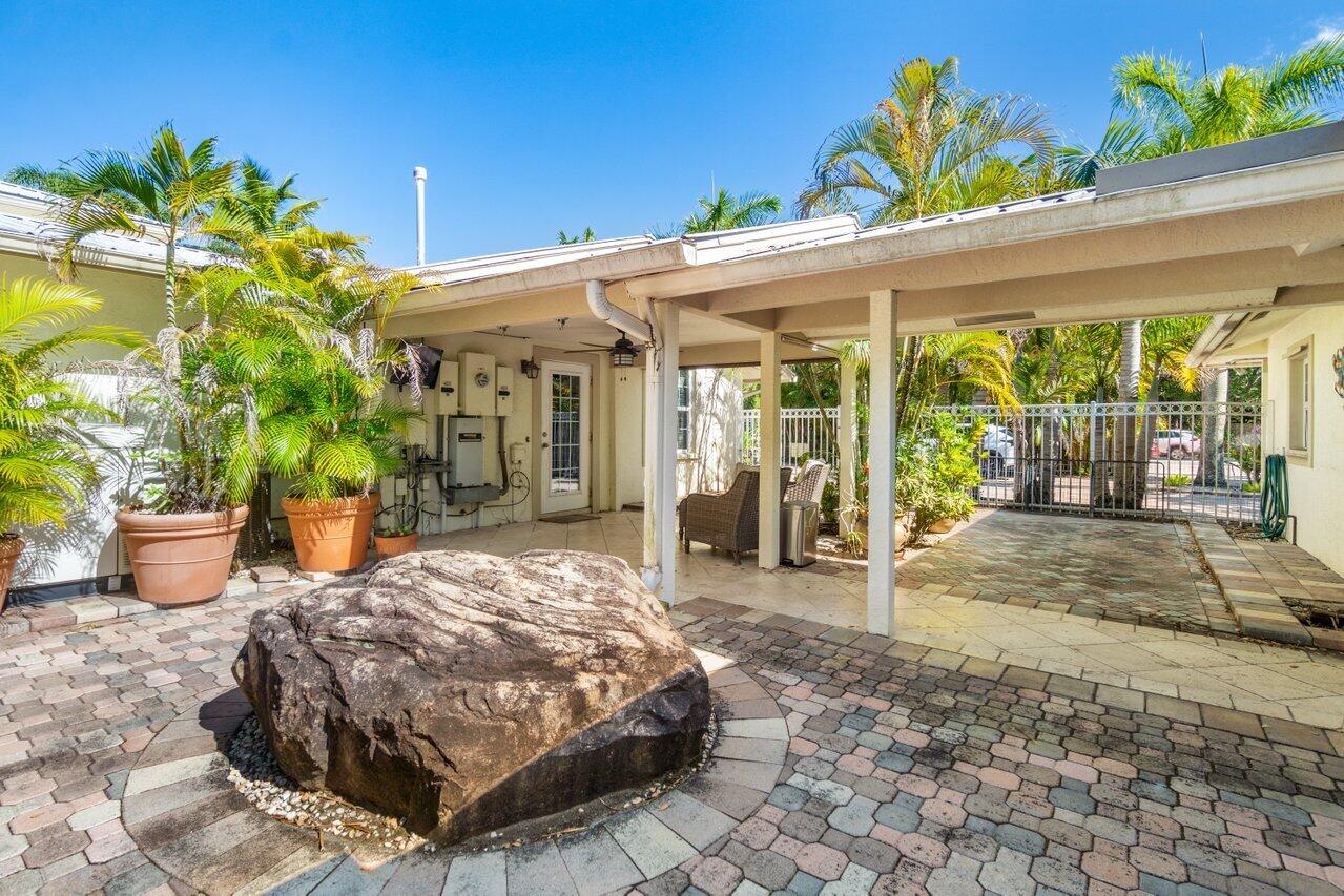 5861 Roebuck Road Jupiter, FL 33458 - Photo 41 of 74 a view of a porch