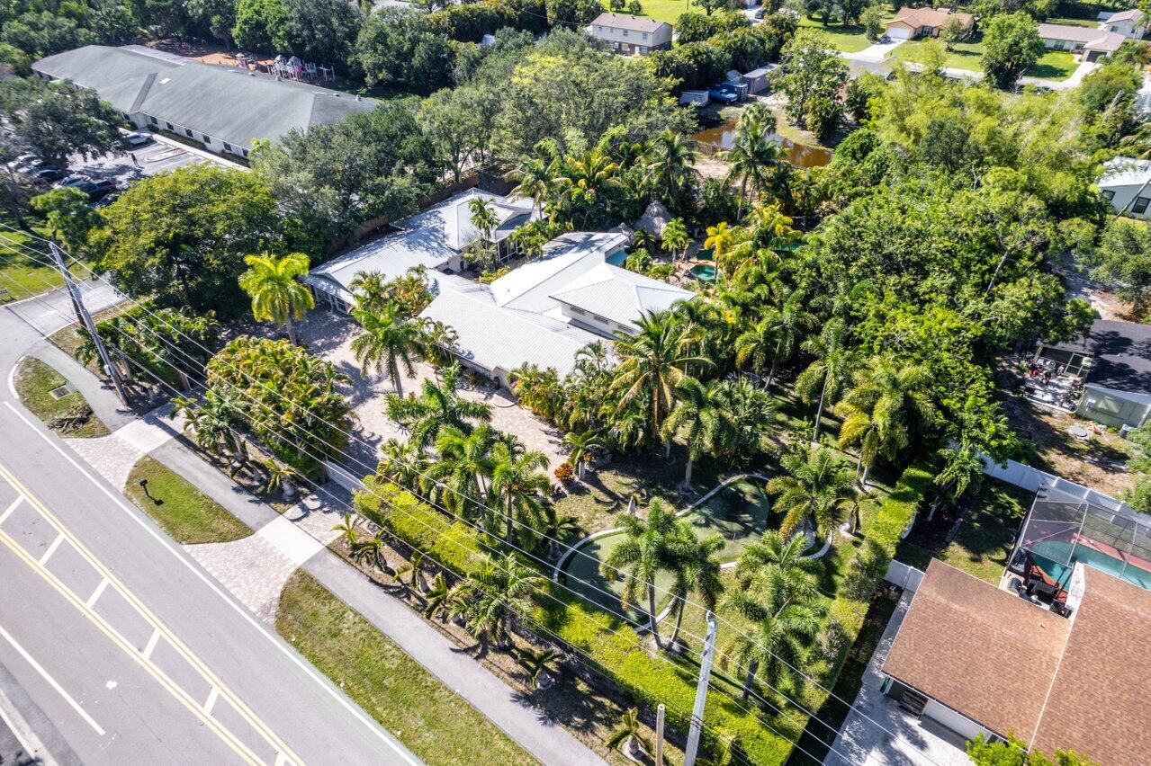 5861 Roebuck Road Jupiter, FL 33458 - Photo 68 of 74 Aerial of Front of House