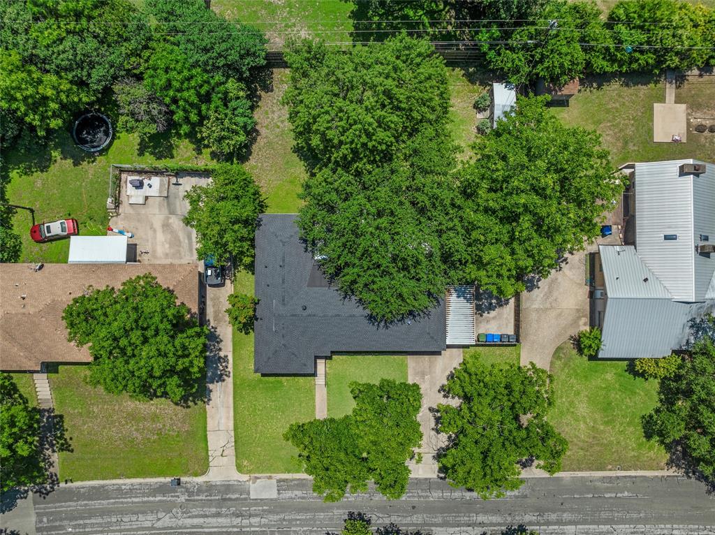 3924 North 30th Street Waco, TX 76708 - Photo 29 of 33 Note large right side patio that serves as a transition point for family between garage/carport and nearby rear home entry making car to kitchen on one level.