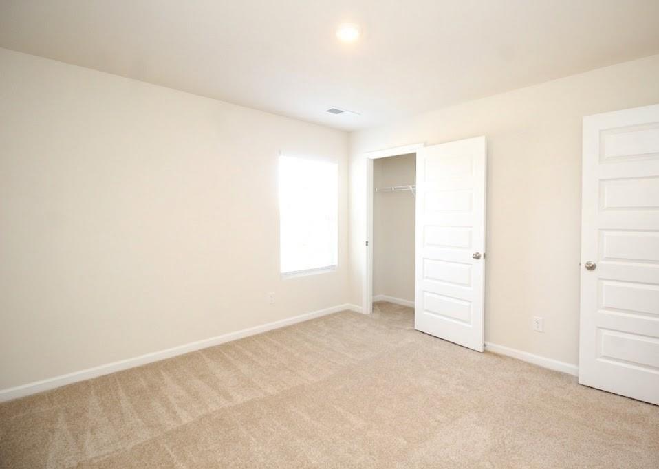 2264 Pelham Pass Dacula, GA 30019 - Photo 17 of 41 an empty room with an entryway
