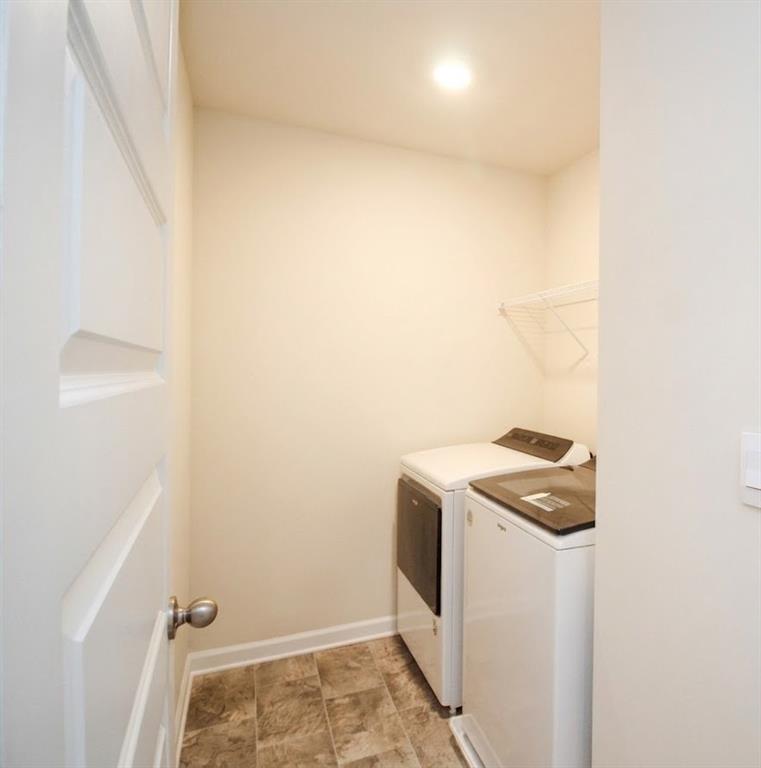 2264 Pelham Pass Dacula, GA 30019 - Photo 21 of 41 a utility room with dryer and washer