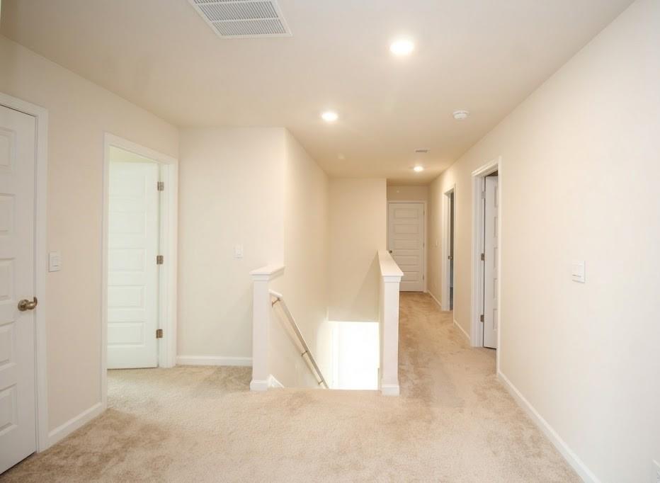 2264 Pelham Pass Dacula, GA 30019 - Photo 33 of 41 a view of a big room with closet and a projector