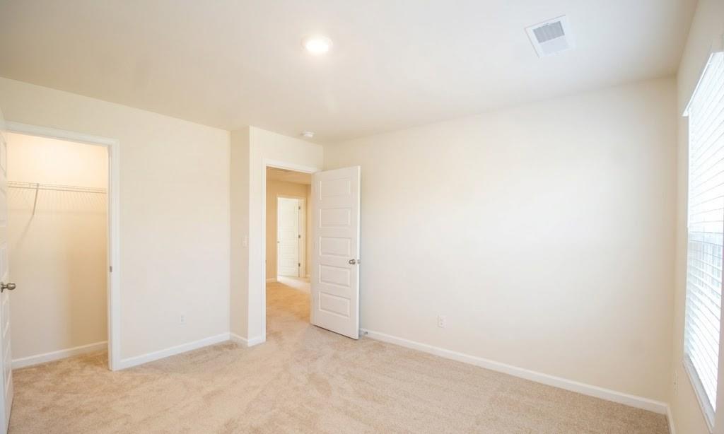 2264 Pelham Pass Dacula, GA 30019 - Photo 34 of 41 a view of an empty room