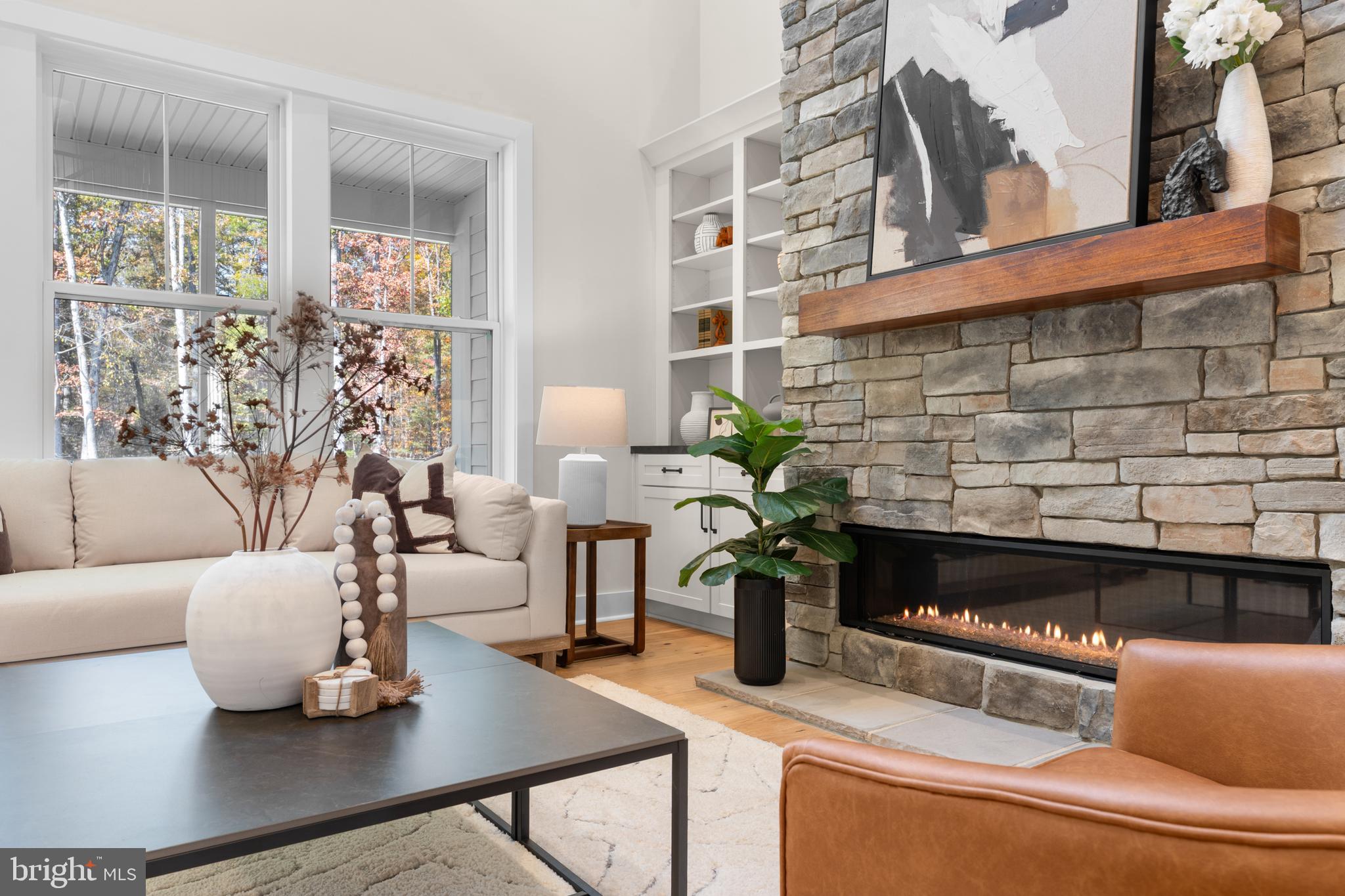 0 Greenwich Road Nokesville, VA 20181 - Photo 19 of 67 a living room with furniture a potted plant and a fireplace