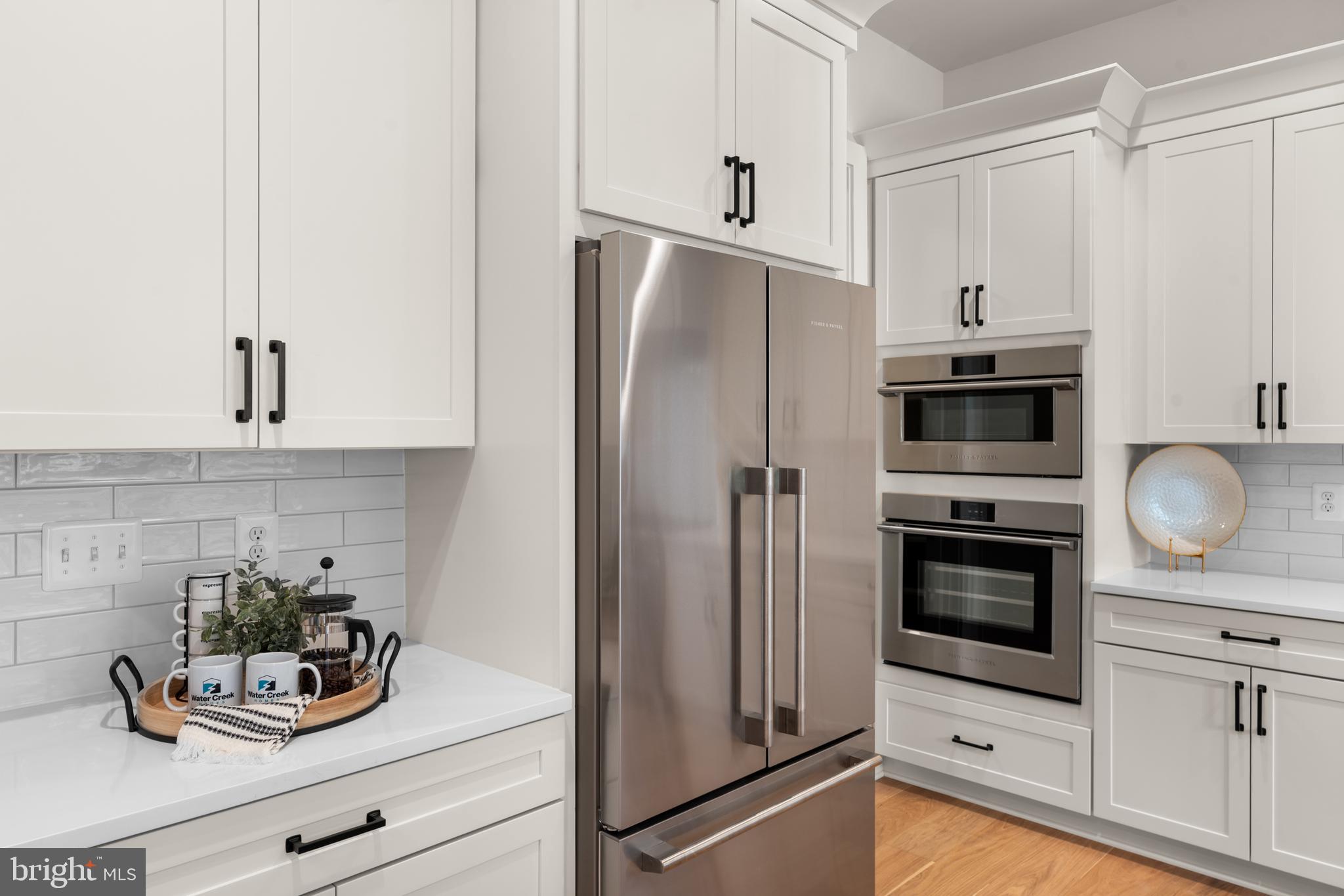 0 Greenwich Road Nokesville, VA 20181 - Photo 28 of 67 a kitchen with granite countertop a refrigerator stove and sink