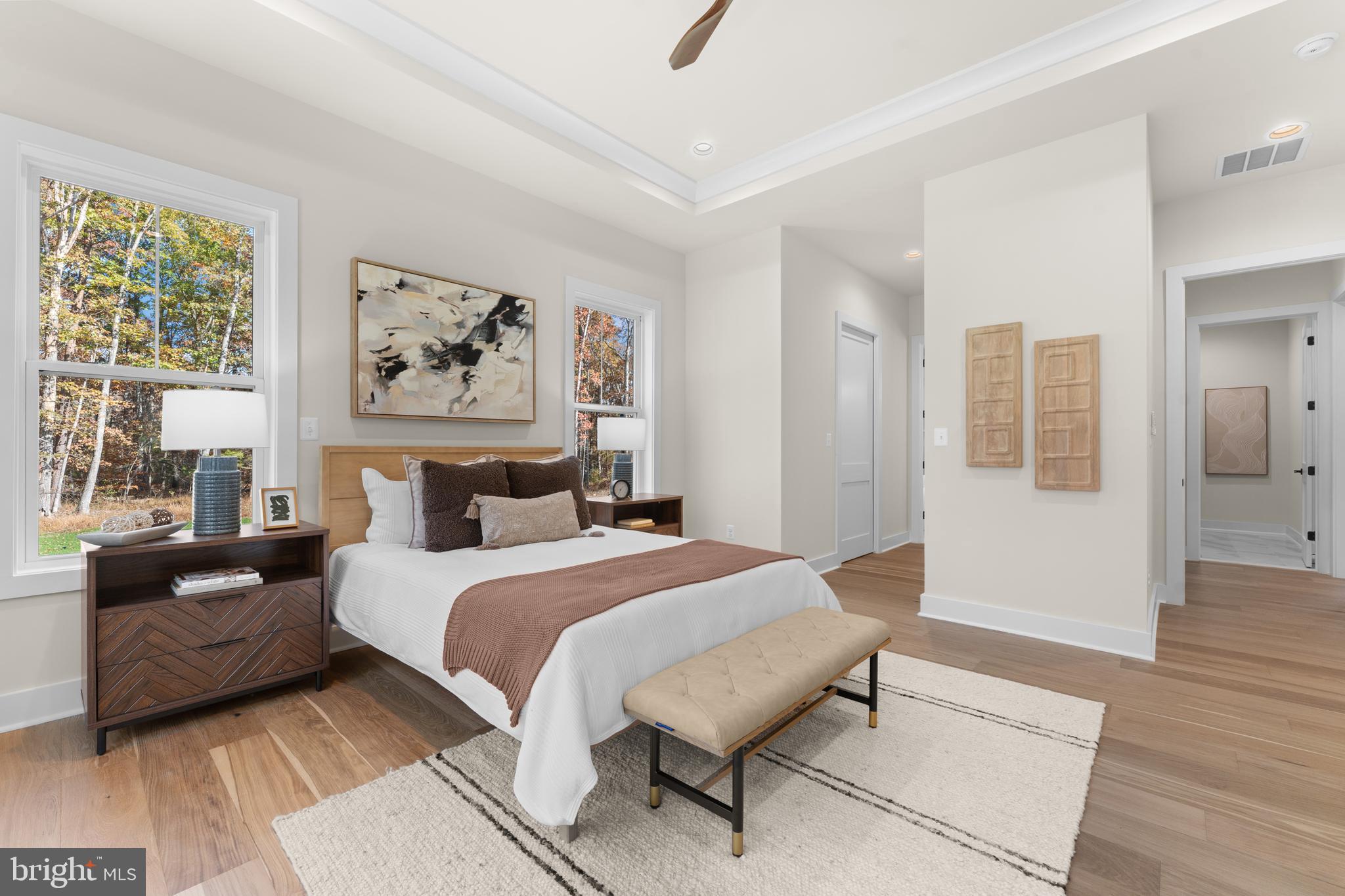 0 Greenwich Road Nokesville, VA 20181 - Photo 34 of 67 a spacious bedroom with a bed and a couch