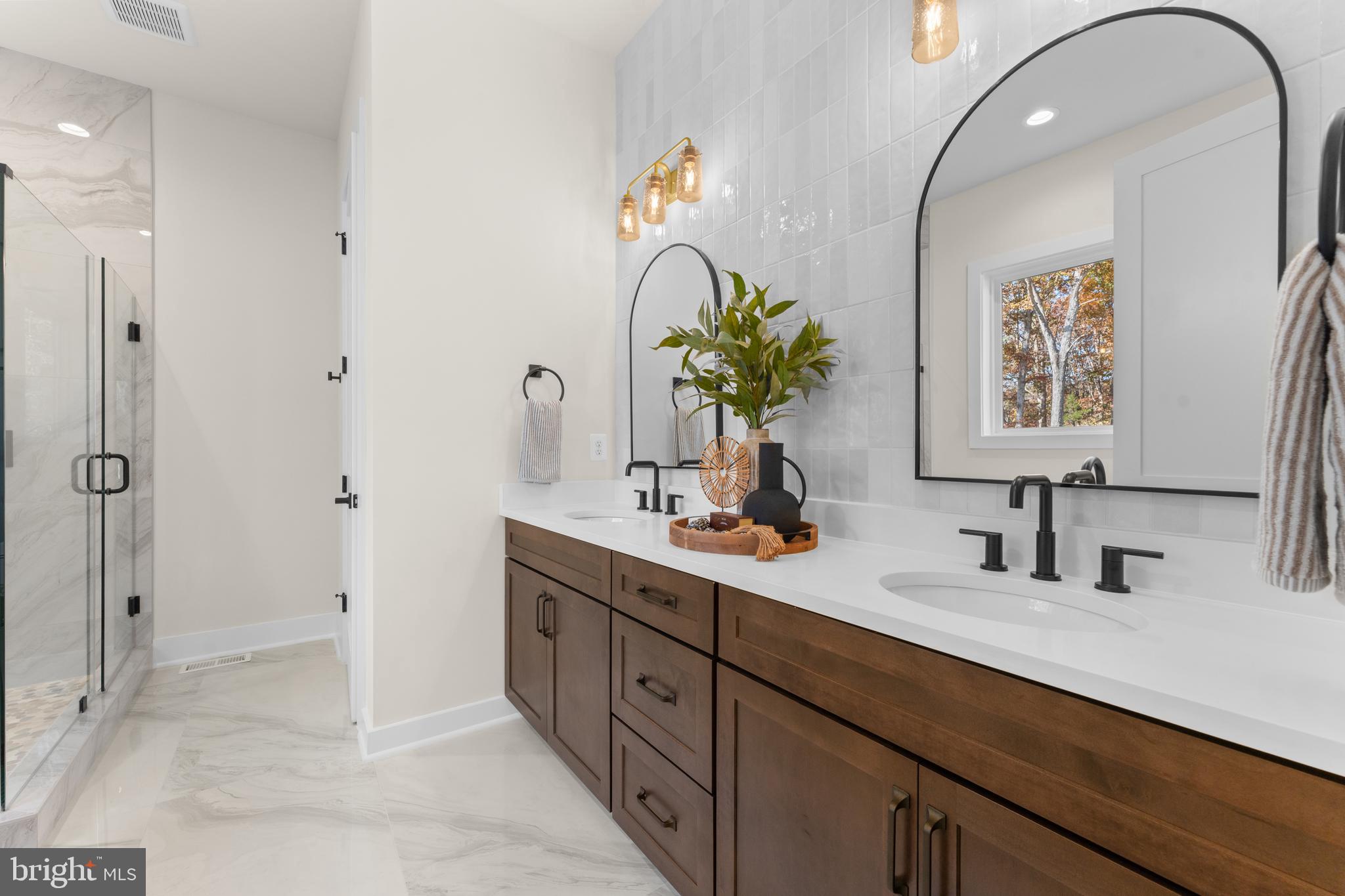0 Greenwich Road Nokesville, VA 20181 - Photo 38 of 67 a bathroom with a double vanity sink and a mirror