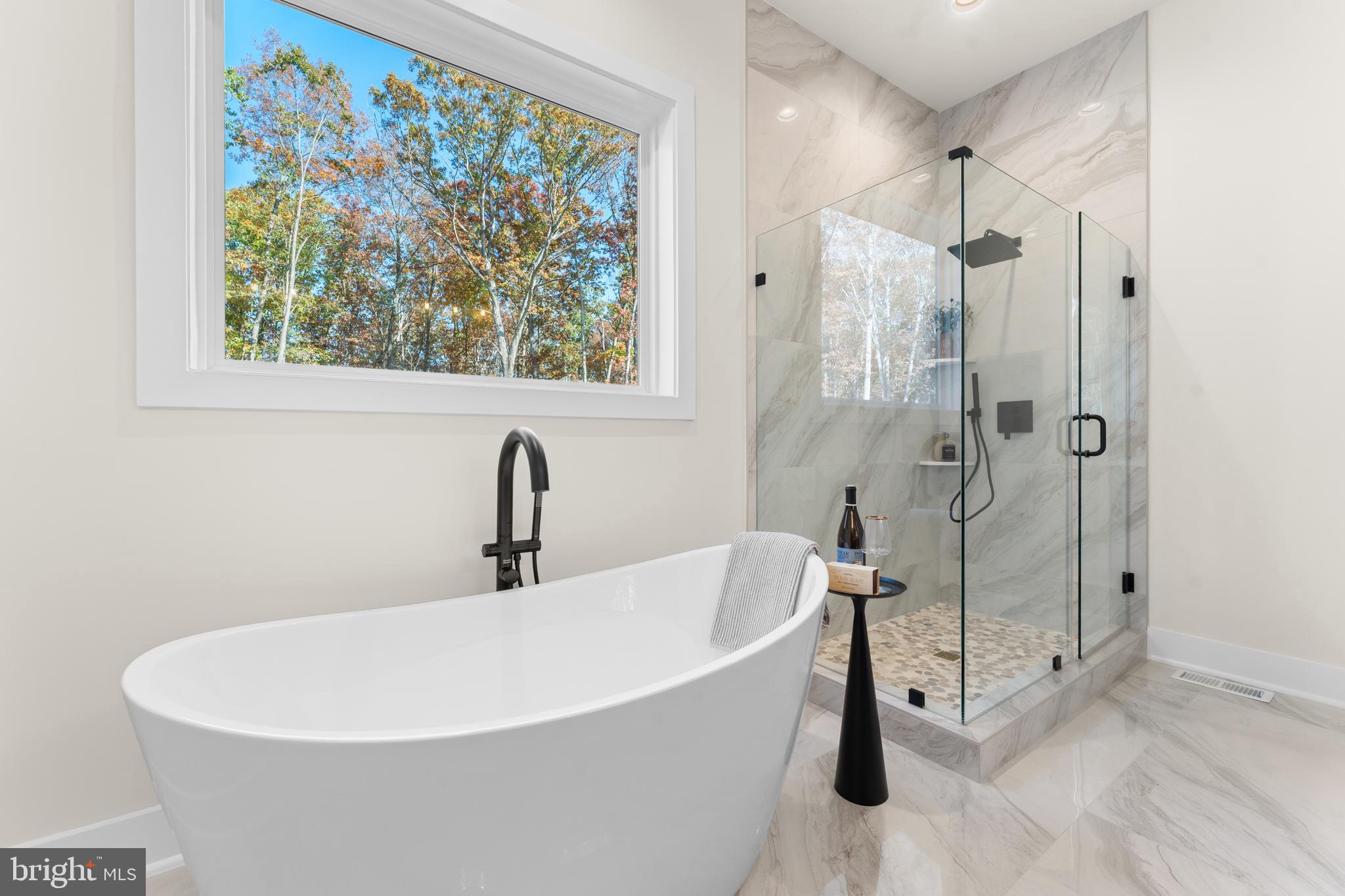 0 Greenwich Road Nokesville, VA 20181 - Photo 40 of 67 a white bath tub sitting next to a shower