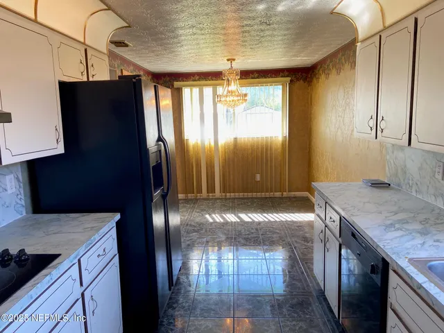 a large bathroom with a sink and a large mirror