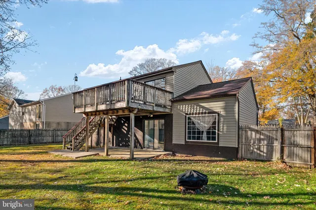 a view of a house with basket ball court