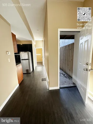 a view of storage and utility room with washer and dryer