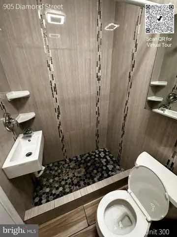 a utility room with sink dryer and washer