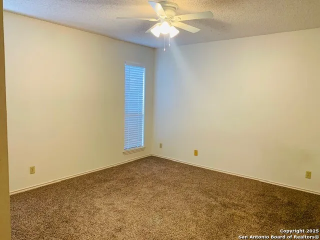 a view of an empty room with window