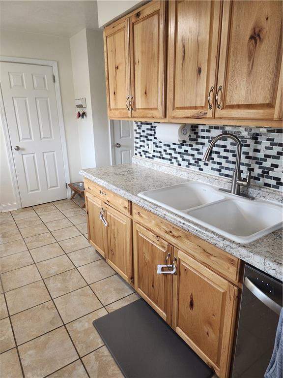 1009 Three Degree Road Butler, PA 16002 - Photo 11 of 33 a kitchen with stainless steel appliances granite countertop a sink stove and cabinets