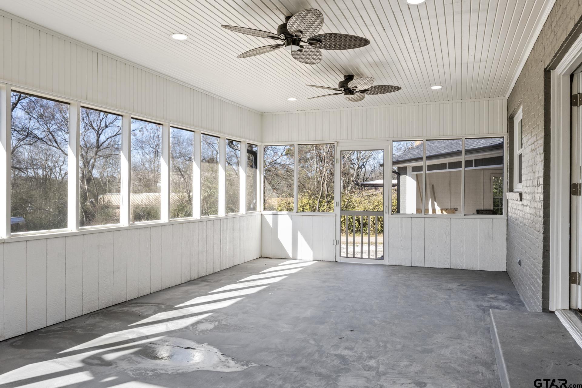 306 Quitman Street Pittsburg, TX 75686 - Photo 29 of 31 a view of an empty room with a window