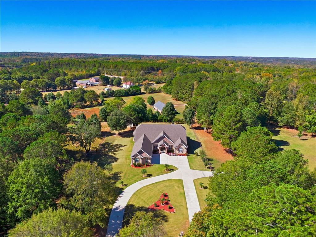 100 Marshas Vineyard Hampton, GA 30228 - Photo 65 of 71 an aerial view of a house with a lake view
