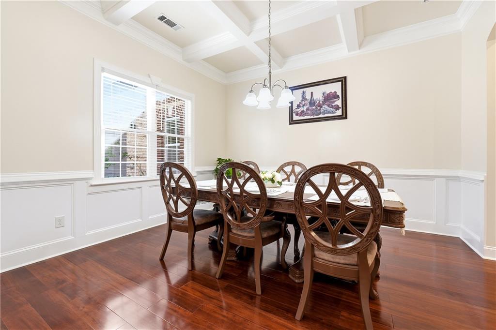 100 Marshas Vineyard Hampton, GA 30228 - Photo 10 of 71 a view of a dining room with furniture window and wooden floor