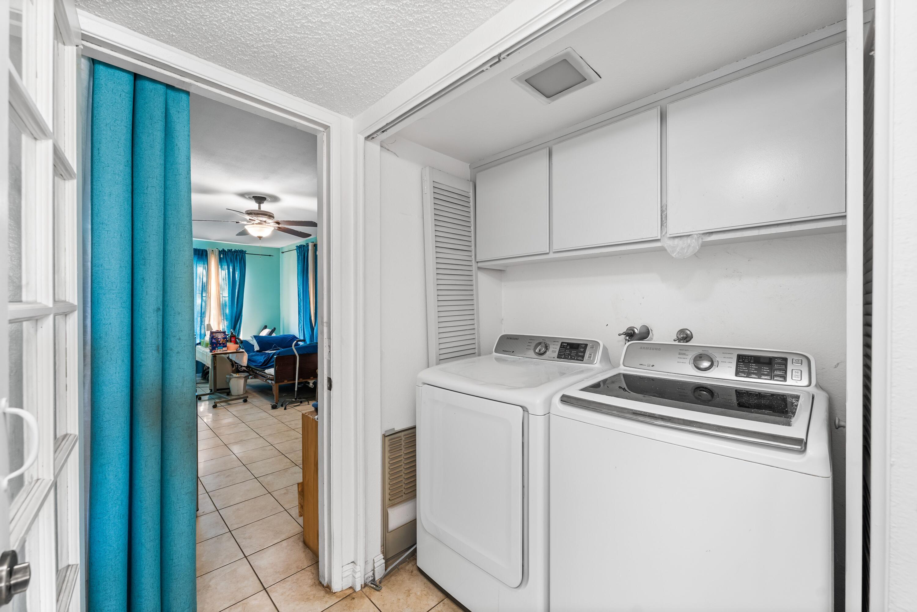 37826 Cardiff Street Palmdale, CA 93550 - Photo 11 of 22 a view of a kitchen and utility room