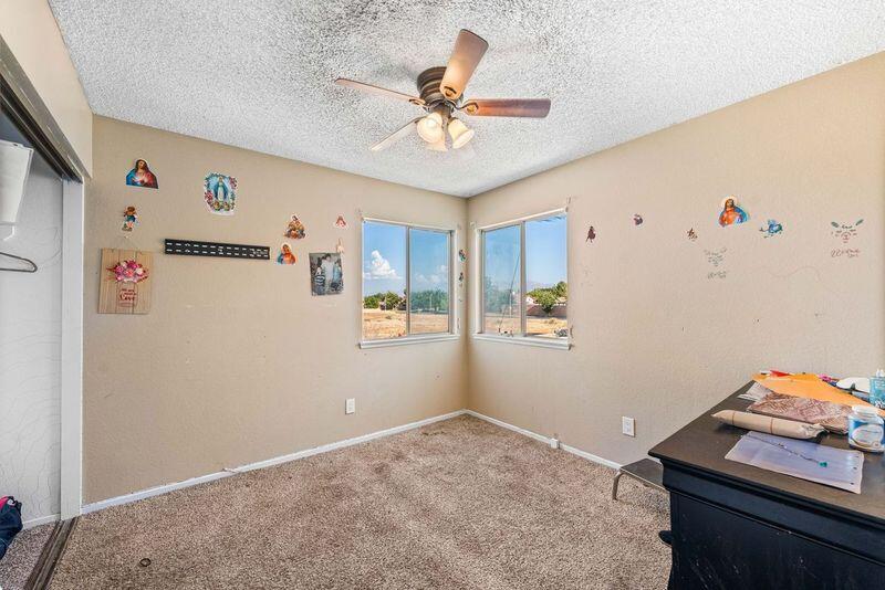 37826 Cardiff Street Palmdale, CA 93550 - Photo 17 of 22 a view of a workspace with furniture and hallway view