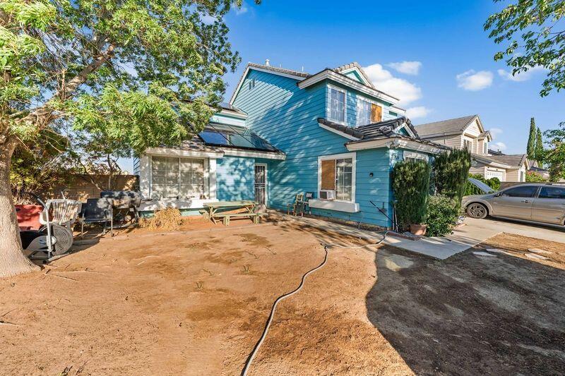 37826 Cardiff Street Palmdale, CA 93550 - Photo 2 of 22 a view of a house with cars park