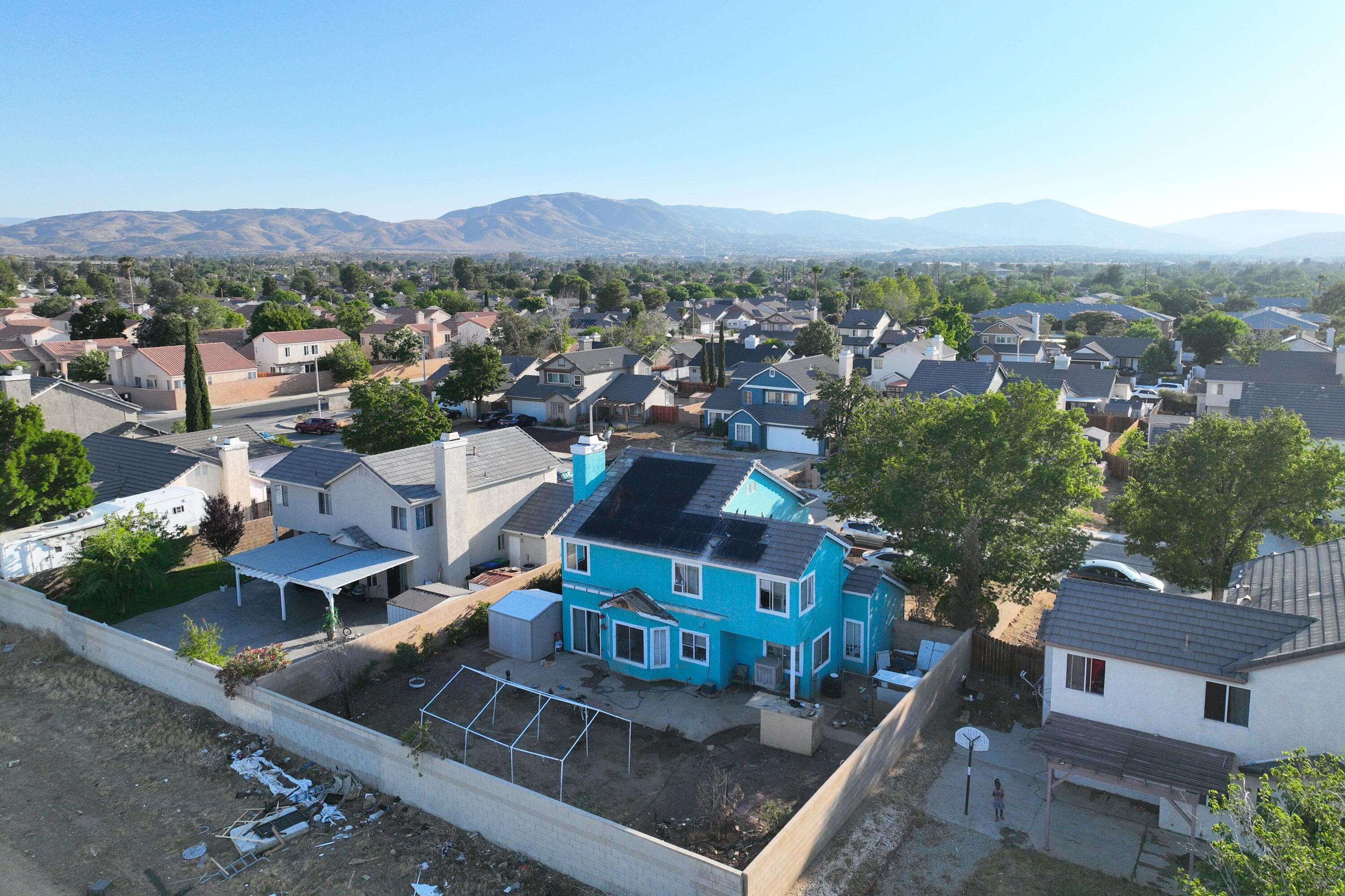 37826 Cardiff Street Palmdale, CA 93550 - Photo 22 of 22 an aerial view of a house with a garden