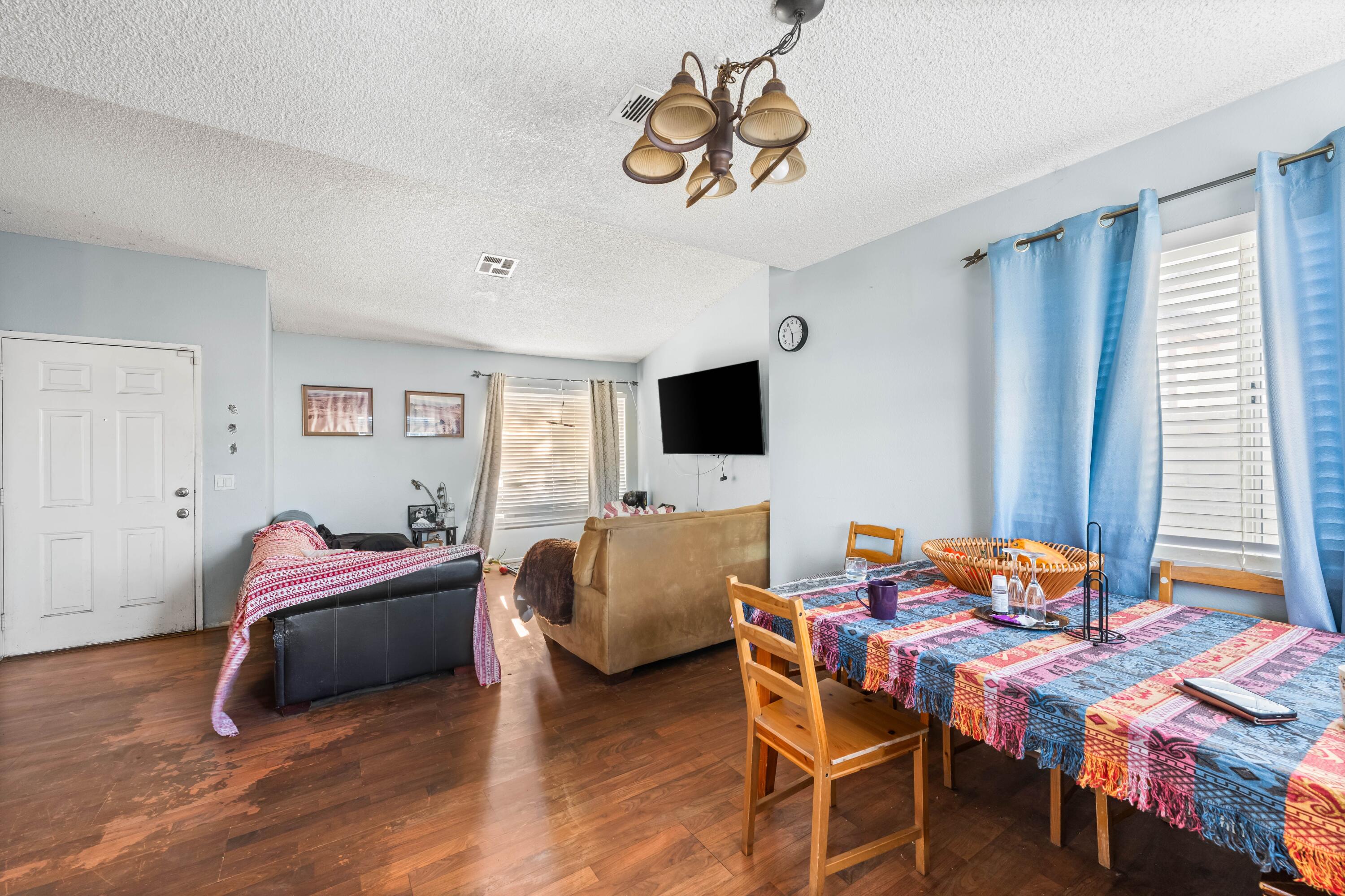 37826 Cardiff Street Palmdale, CA 93550 - Photo 6 of 22 a bedroom with a bed and a tv