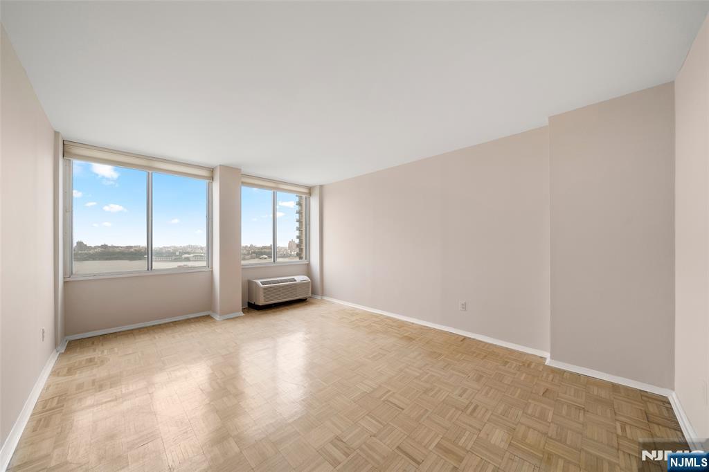 200 Winston Drive, Unit 508 Cliffside Park, NJ 07010 - Photo 20 of 25 a view of an empty room with a window