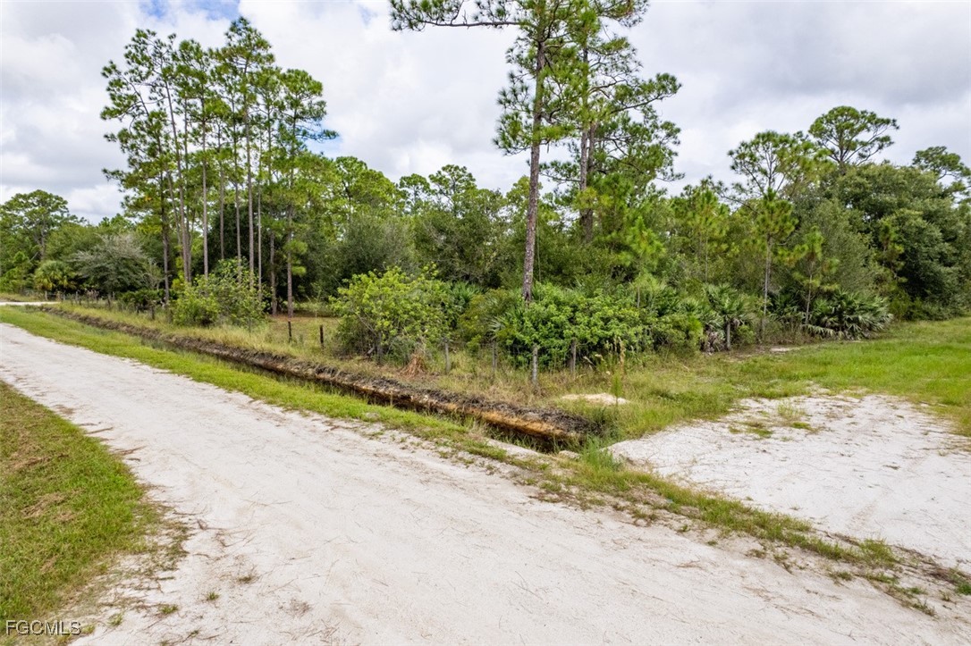 2201 Riviera Avenue Clewiston, FL 33440 - Photo 31 of 31 a view of a lake view with a garden