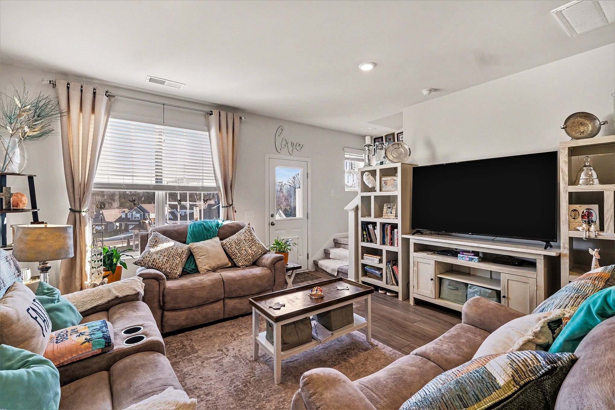 2563 Drumwright Way Columbia, TN 38401 - Photo 18 of 28 a living room with furniture and a flat screen tv
