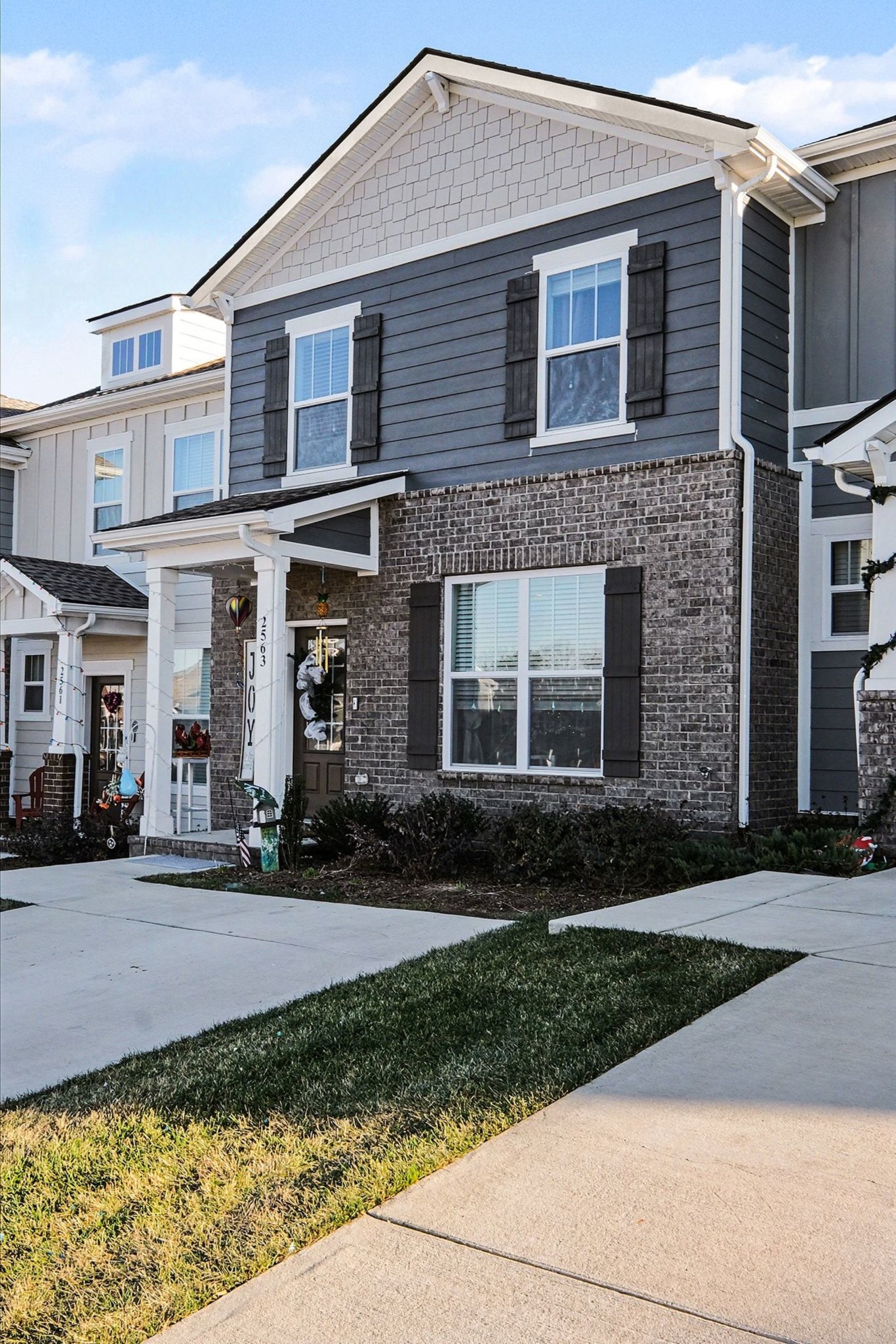 2563 Drumwright Way Columbia, TN 38401 - Photo 4 of 28 a front view of a house with a yard