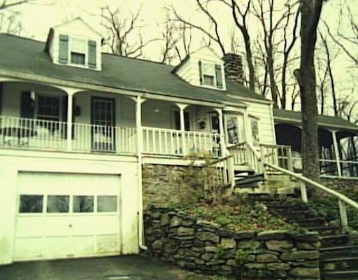 23 Junction Road Brookfield, CT 06804 - Photo 1 of 1 a front view of a house with a yard