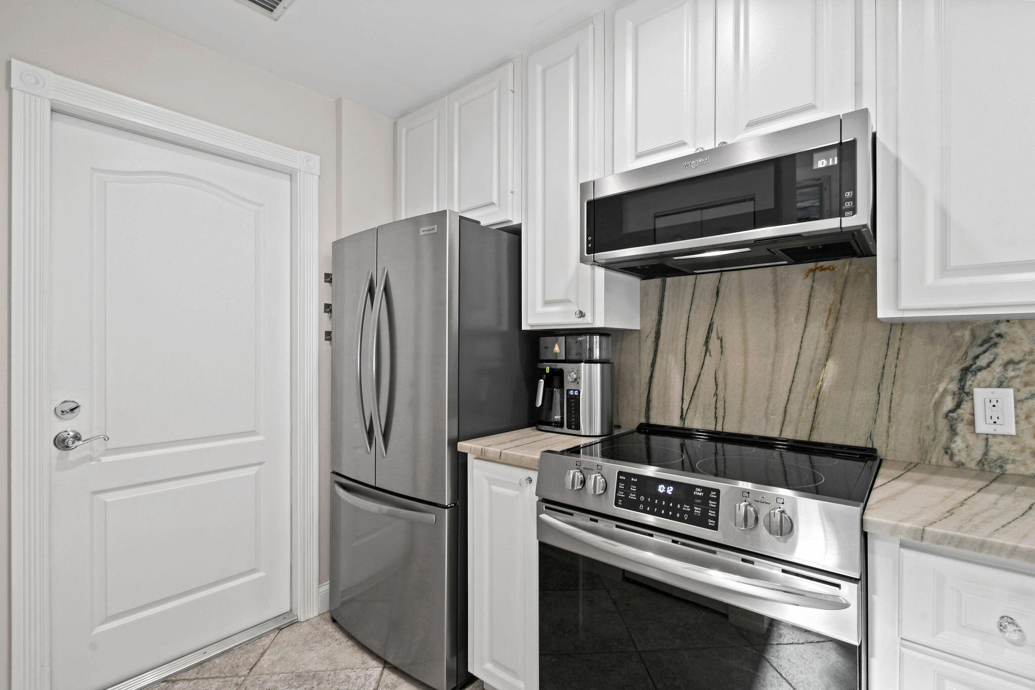 59 Live Oak Circle Tequesta, FL 33469 - Photo 12 of 35 59LiveOakCircle(25)Kitchen 2