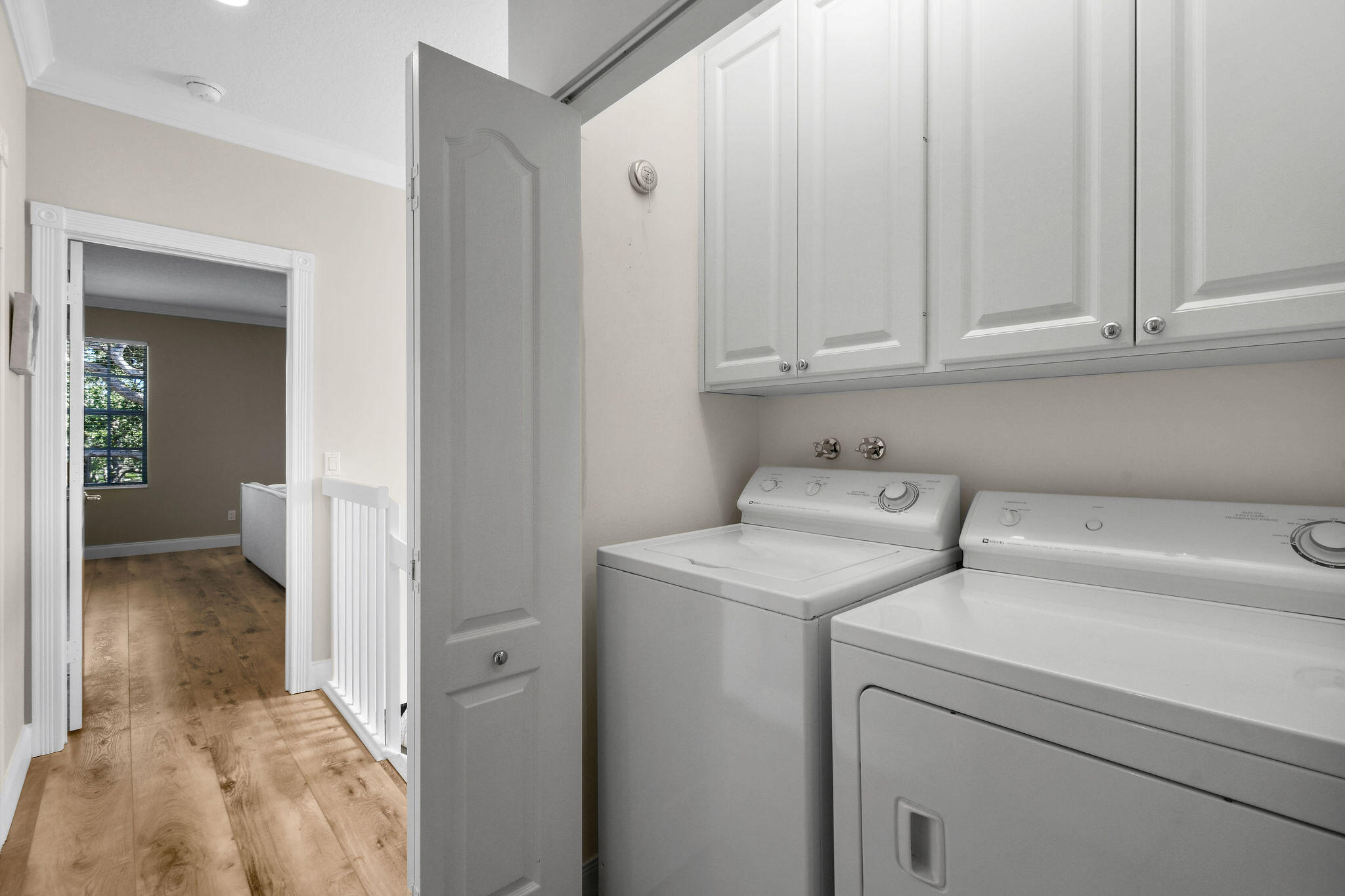 59 Live Oak Circle Tequesta, FL 33469 - Photo 28 of 35 59LiveOakCircle(54)washer & dryer upstai