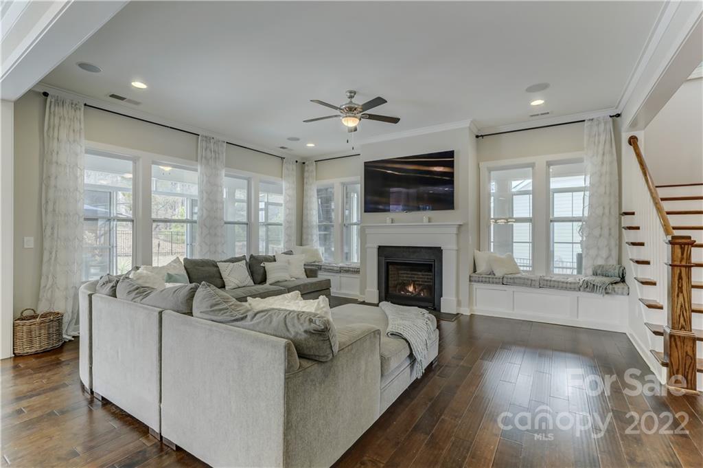 1912 Masons Bend Drive Fort Mill, SC 29708 - Photo 7 of 32 a living room with furniture fireplace and flat screen tv