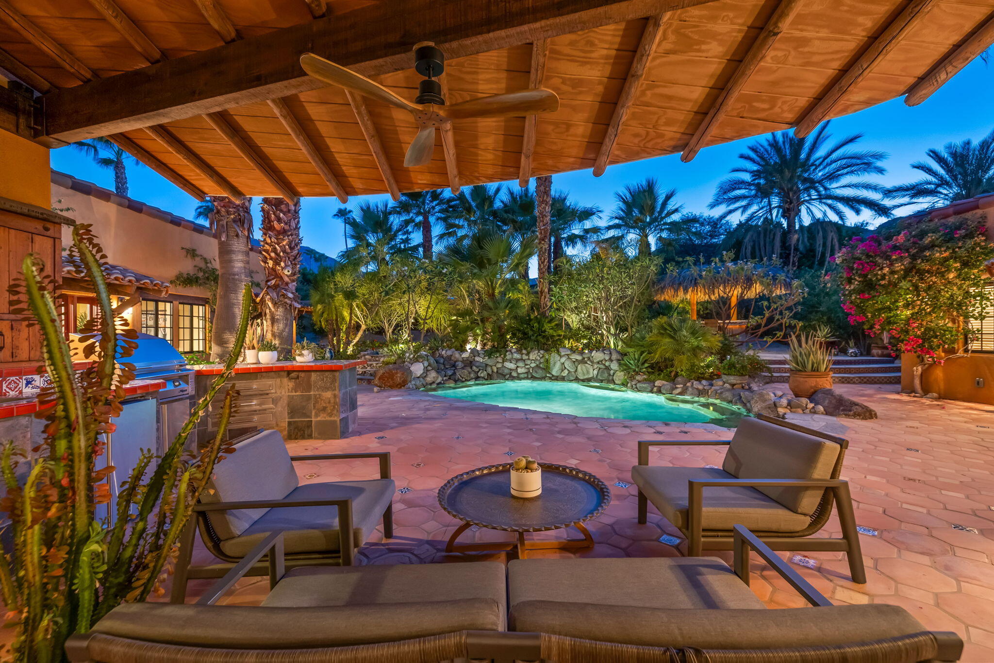 71429 Mirage Road Rancho Mirage, CA 92270 - Photo 13 of 65 a patio with a table and chairs and a barbeque