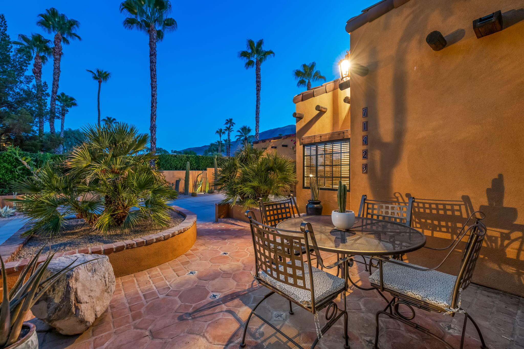 71429 Mirage Road Rancho Mirage, CA 92270 - Photo 15 of 65 a backyard of a house with outdoor seating