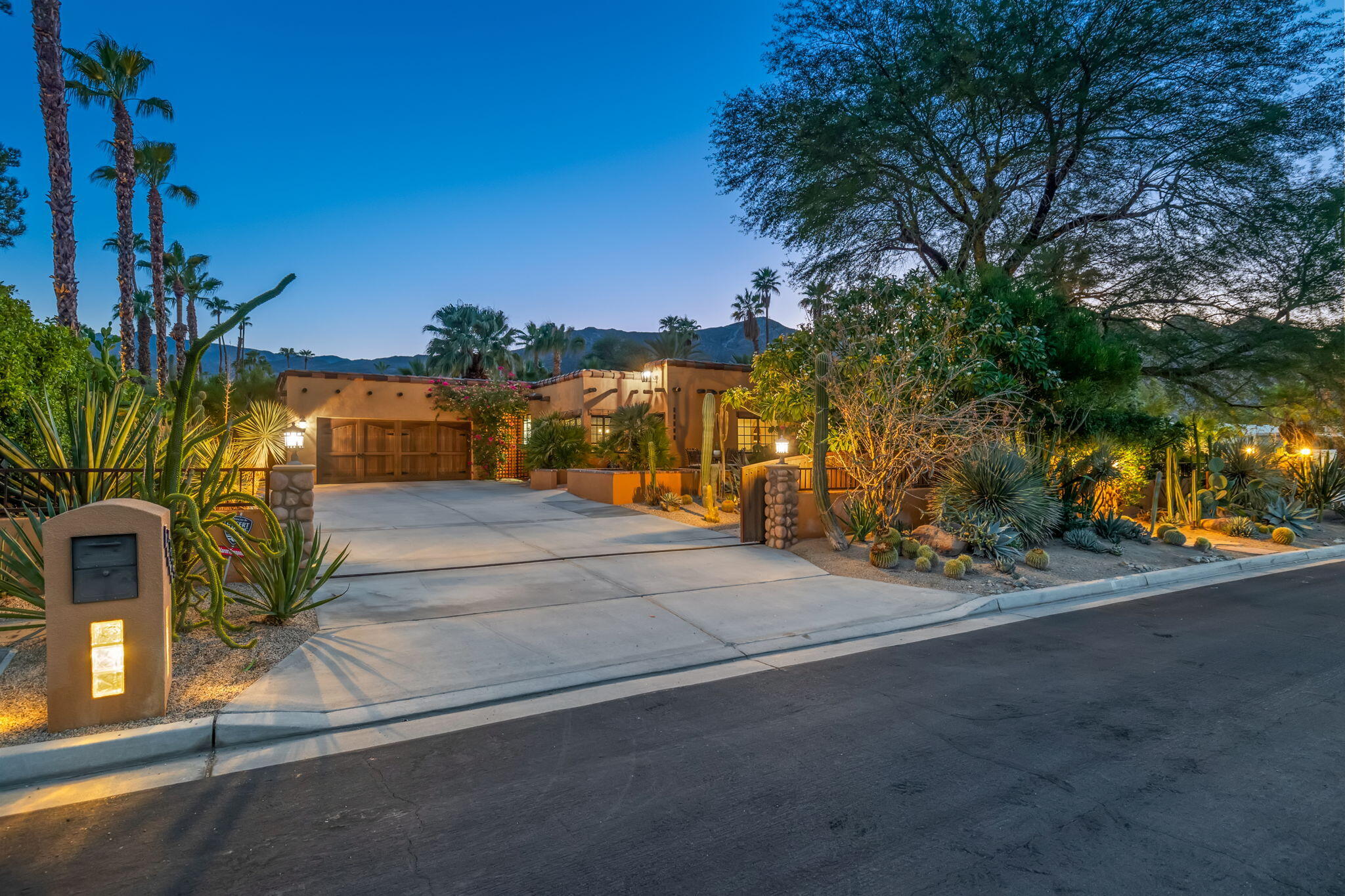 71429 Mirage Road Rancho Mirage, CA 92270 - Photo 18 of 65 a street view with large trees