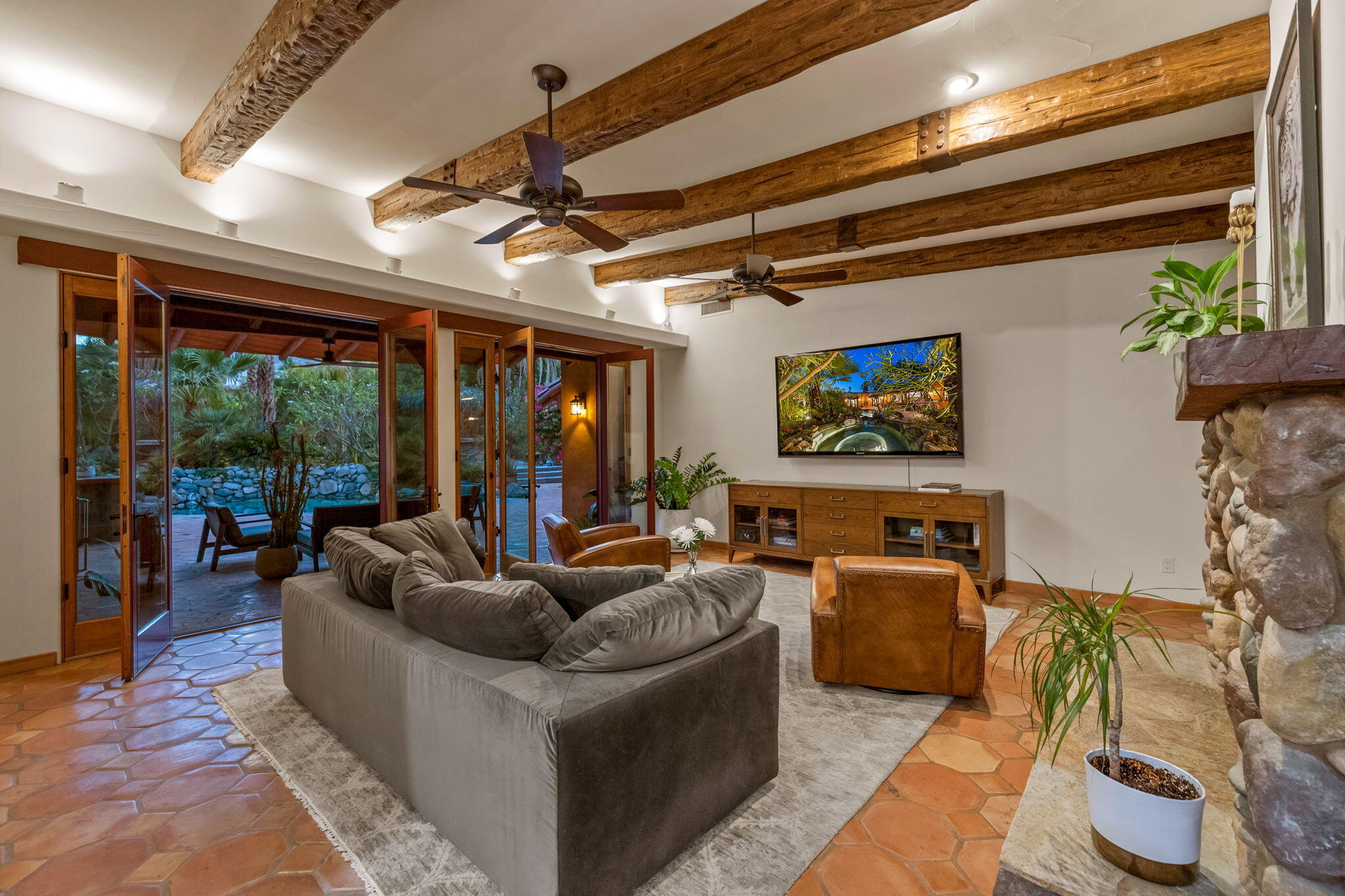 71429 Mirage Road Rancho Mirage, CA 92270 - Photo 22 of 65 a living room with furniture and a flat screen tv