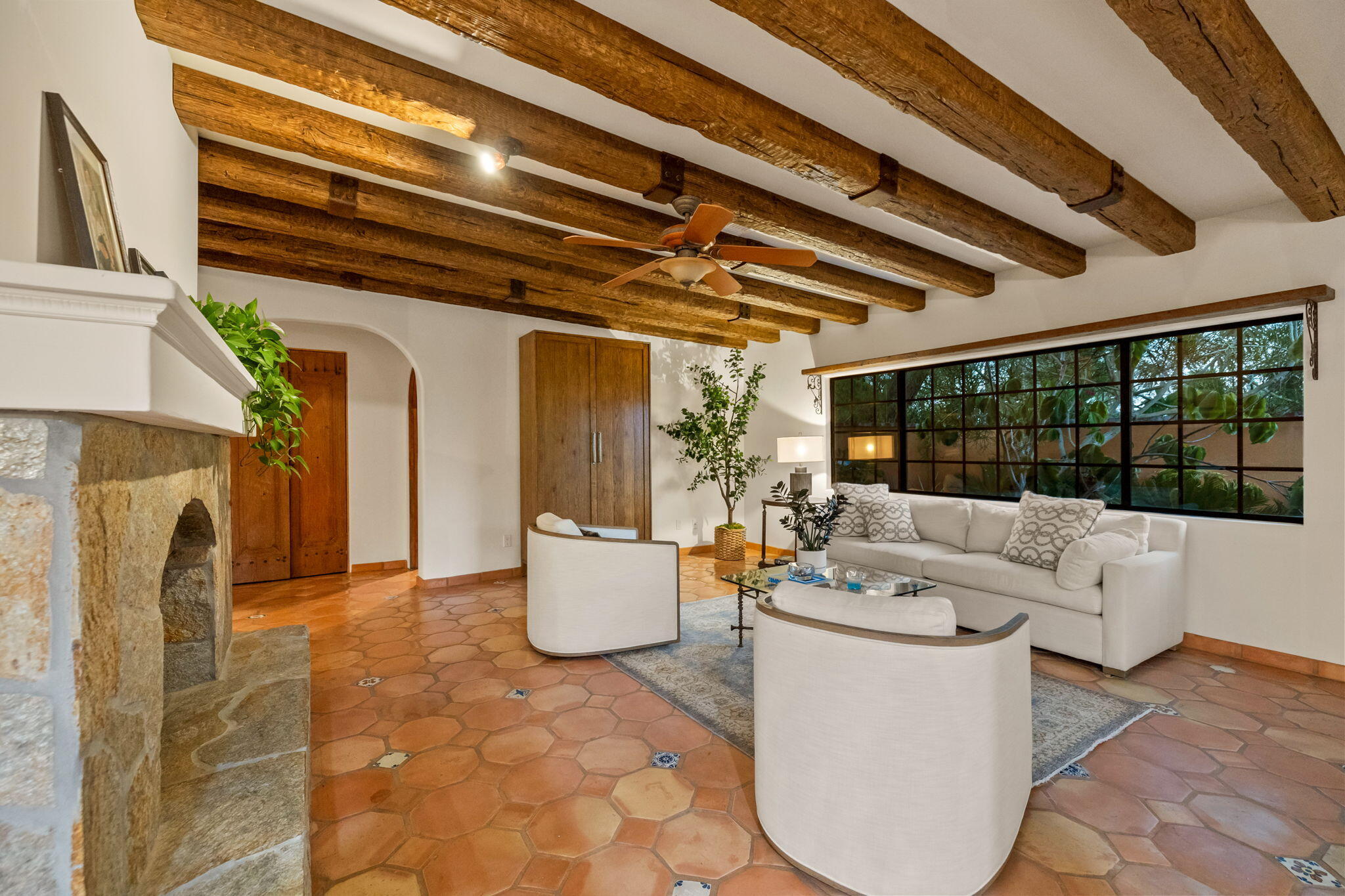 71429 Mirage Road Rancho Mirage, CA 92270 - Photo 23 of 65 a living room with patio furniture and a fireplace
