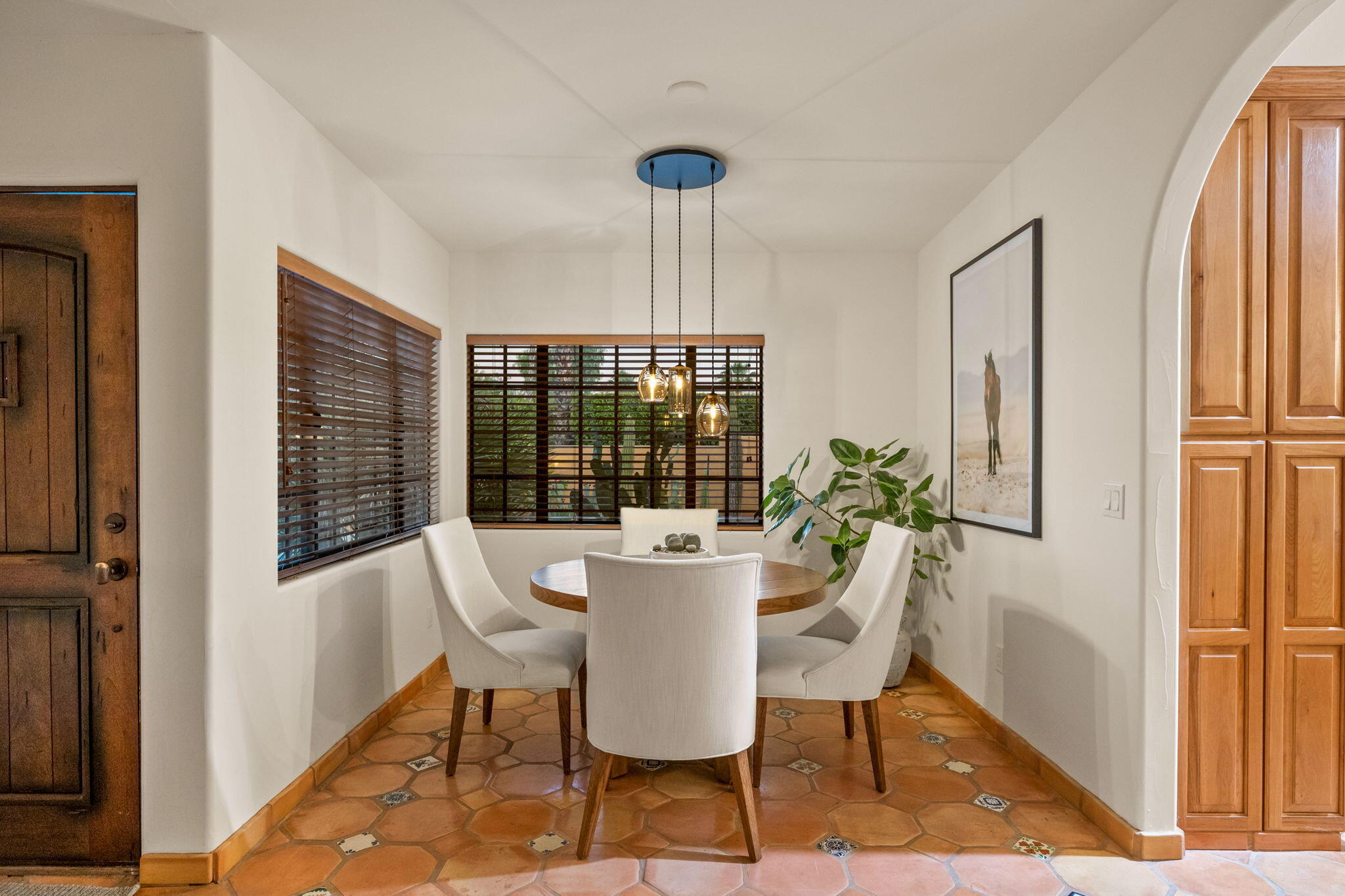 71429 Mirage Road Rancho Mirage, CA 92270 - Photo 32 of 65 a dining room with furniture window wooden floor