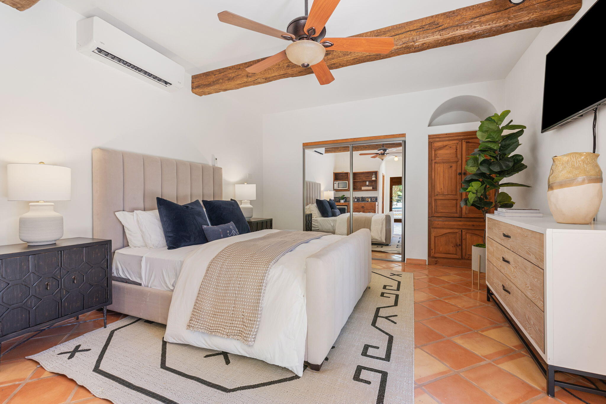 71429 Mirage Road Rancho Mirage, CA 92270 - Photo 36 of 65 a bed room with a bed window and a potted plant